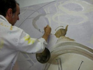 O artista na pintura do quadro “O Tempo”.